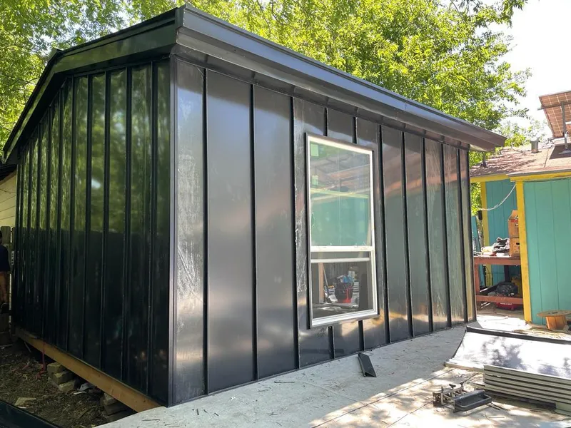 Black standing seam metal wall panels for Metal Roof Installation in Stow